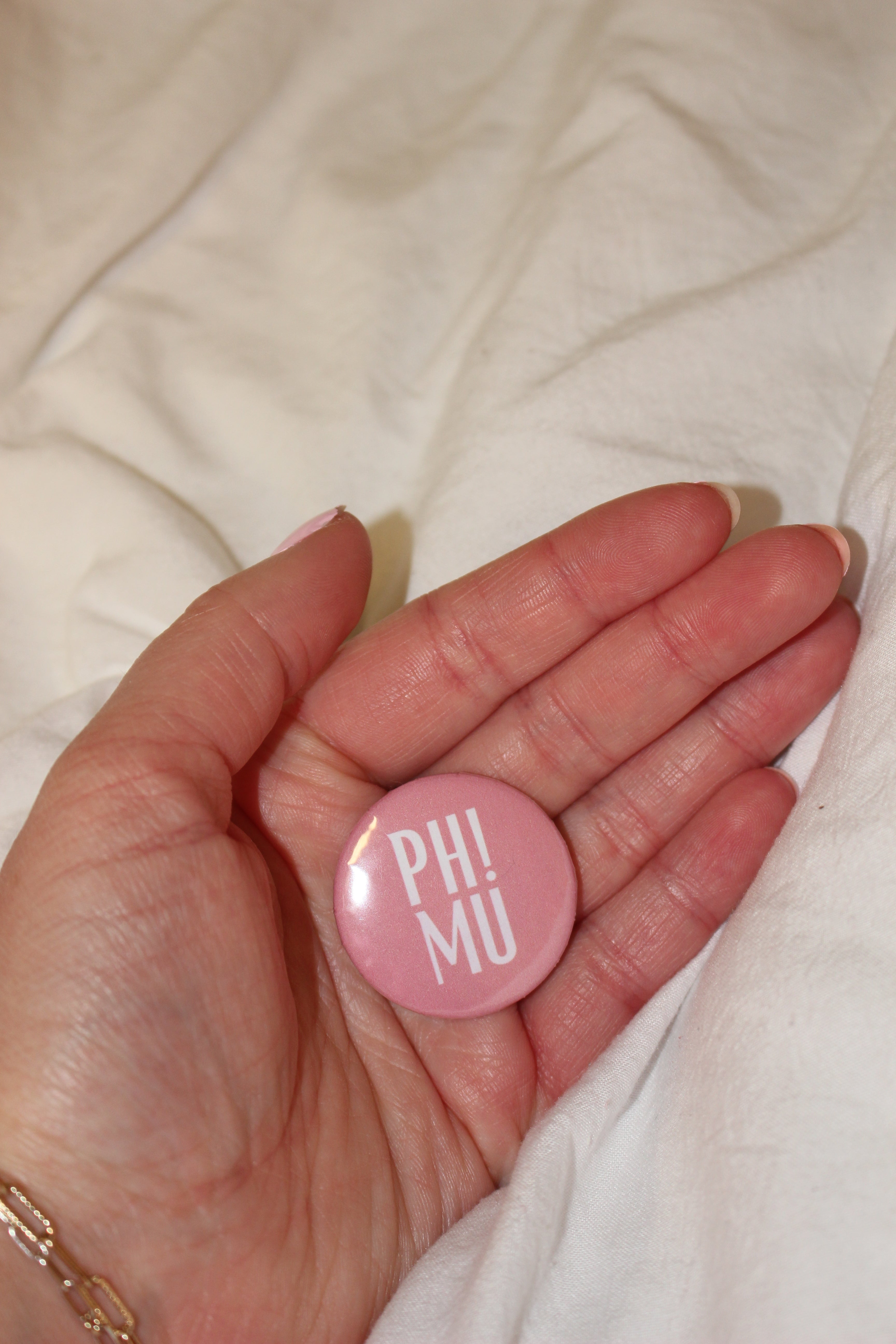 "PH! MU" button